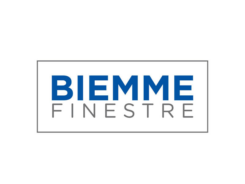 Logo "BIEMME FINESTRE": "BIEMME" blu, "FINESTRE" grigio, racchiuso in un rettangolo grigio.